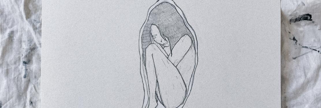 en medio del papel una mujer hecha bolita dentro de un capullo que cuelga desde la parte superior. dentro del capullo ella ocupa todo el espacio, como hecho a medida. parece tranquila.
