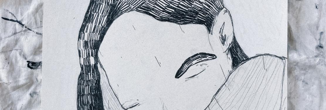 una persona como hecha bolita. vemos solo parte de su rostro y sus manos dándose un abrazo a sí mismo. vemos también una parte de su pierna. El fondo tiene trazos blancos.